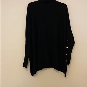 Oversized black turtleneck tunic